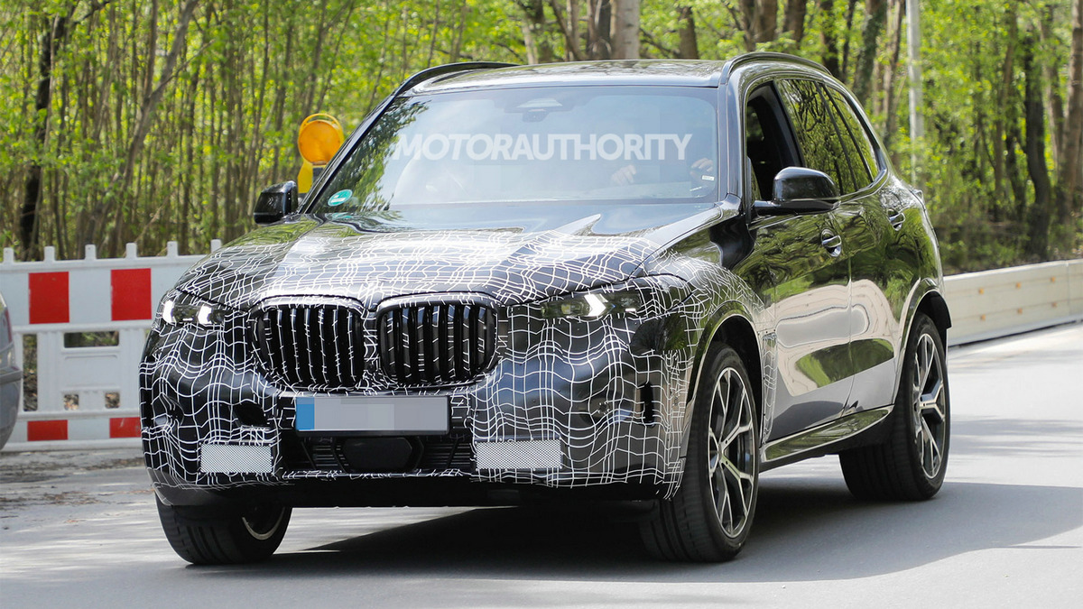 2023-bmw-x5-facelift-spy-shots--photo-credits-baldauf-sb-medien_100839491.jpg